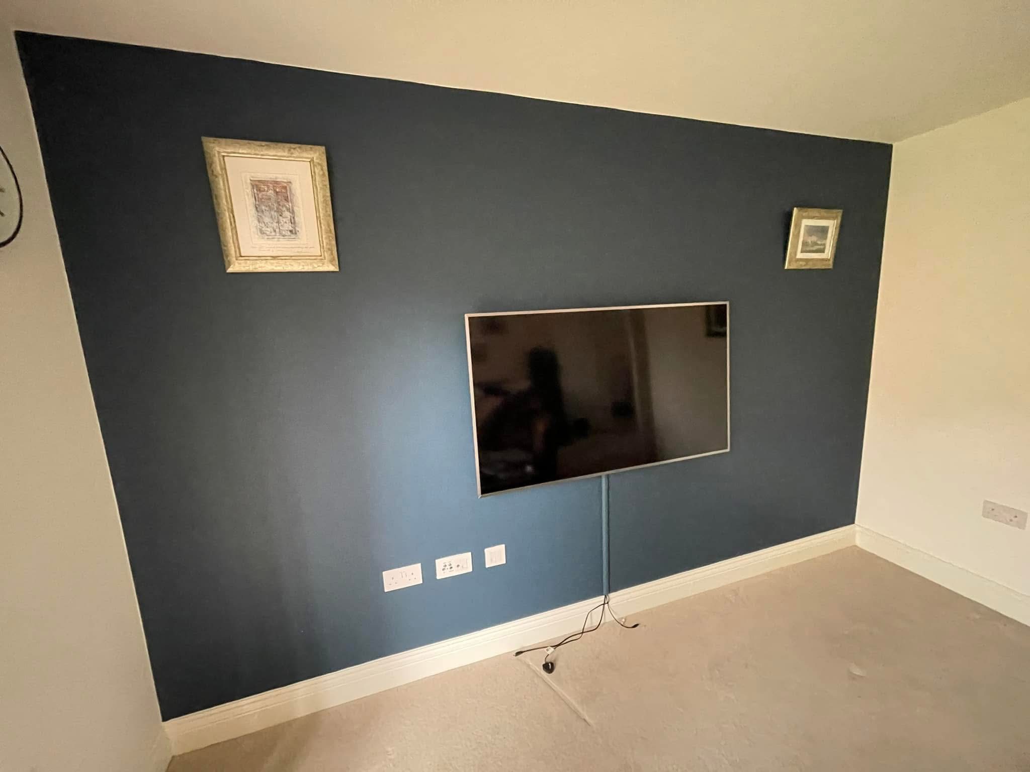 Feature wall painted and TV mounted