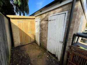 Garage doors & shed before
